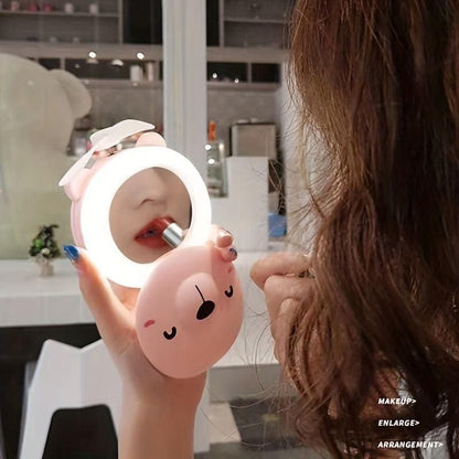 PiggyGlow™ 3-in-1 Pocket Fan | LED Light + Mirror + Rechargeable Mini Fan